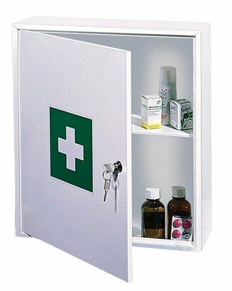 White lockable medicine cabinet with green cross on door, open door shows two shelves with medicines and first aid items.