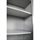 Grey metal storage cabinet, viewed from inside looking up at multiple shelves with perforated edges.